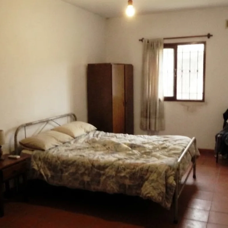 Casa En Venta En Lobos - dormitorio-principal | Nicolás Spinosa Inmobiliaria